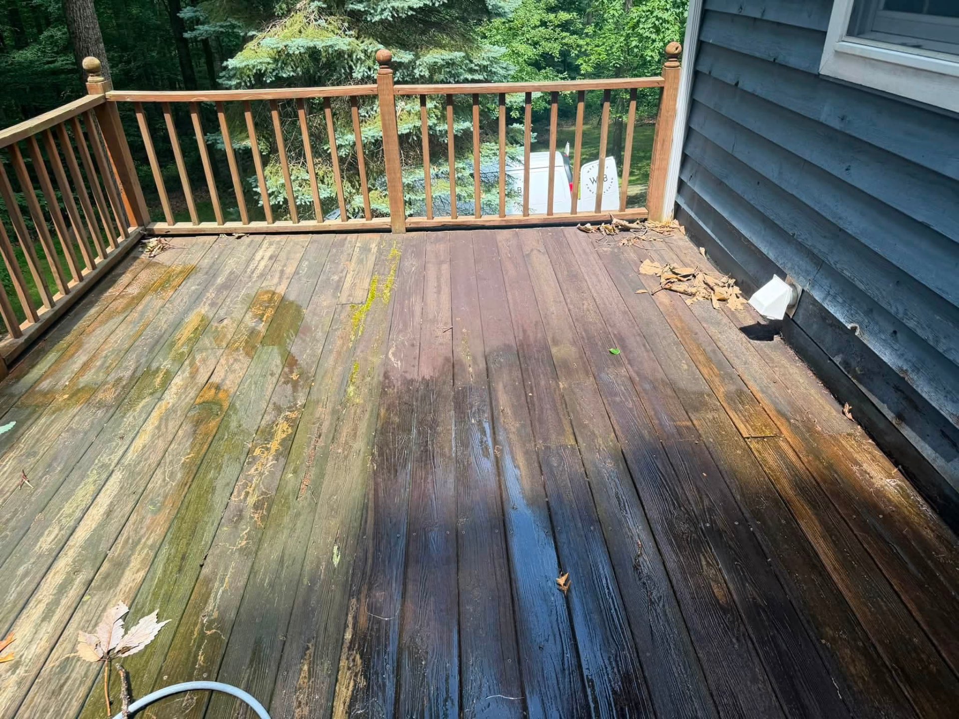 Before — Weathered wood deck restored with soft washing by Vivify