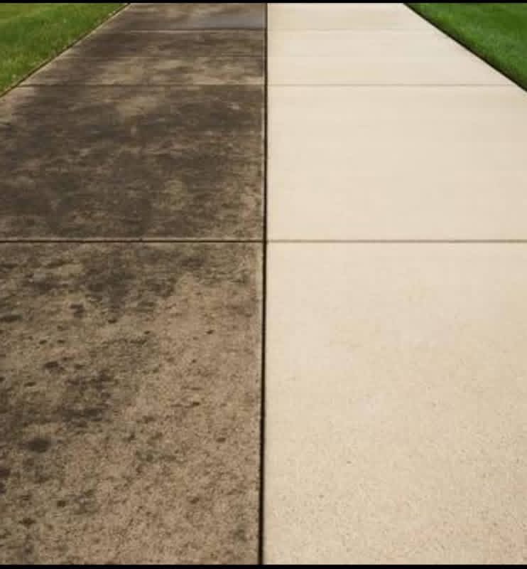 Concrete driveway before and after pressure washing by Vivify